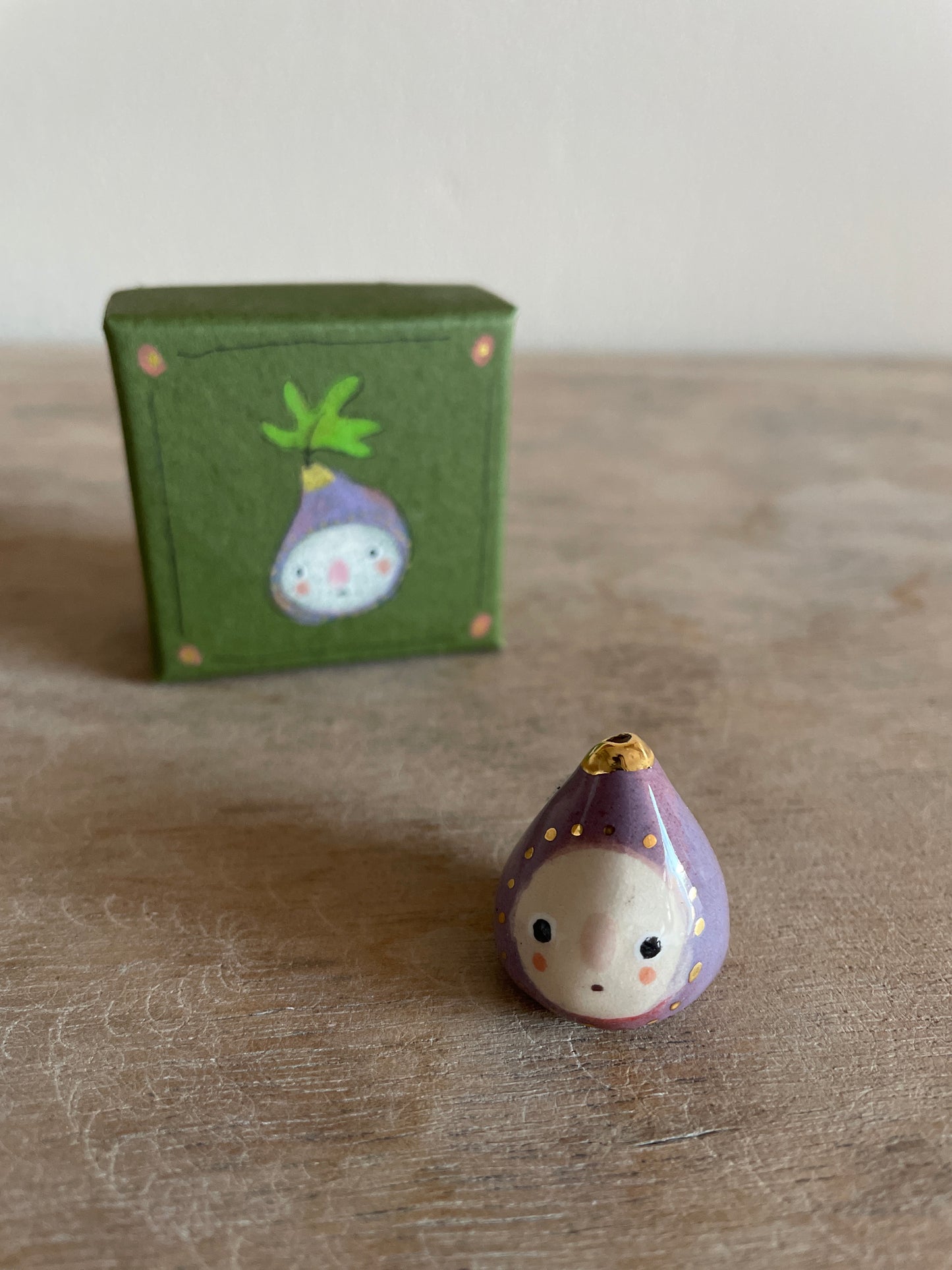 Mini figue faïence et or