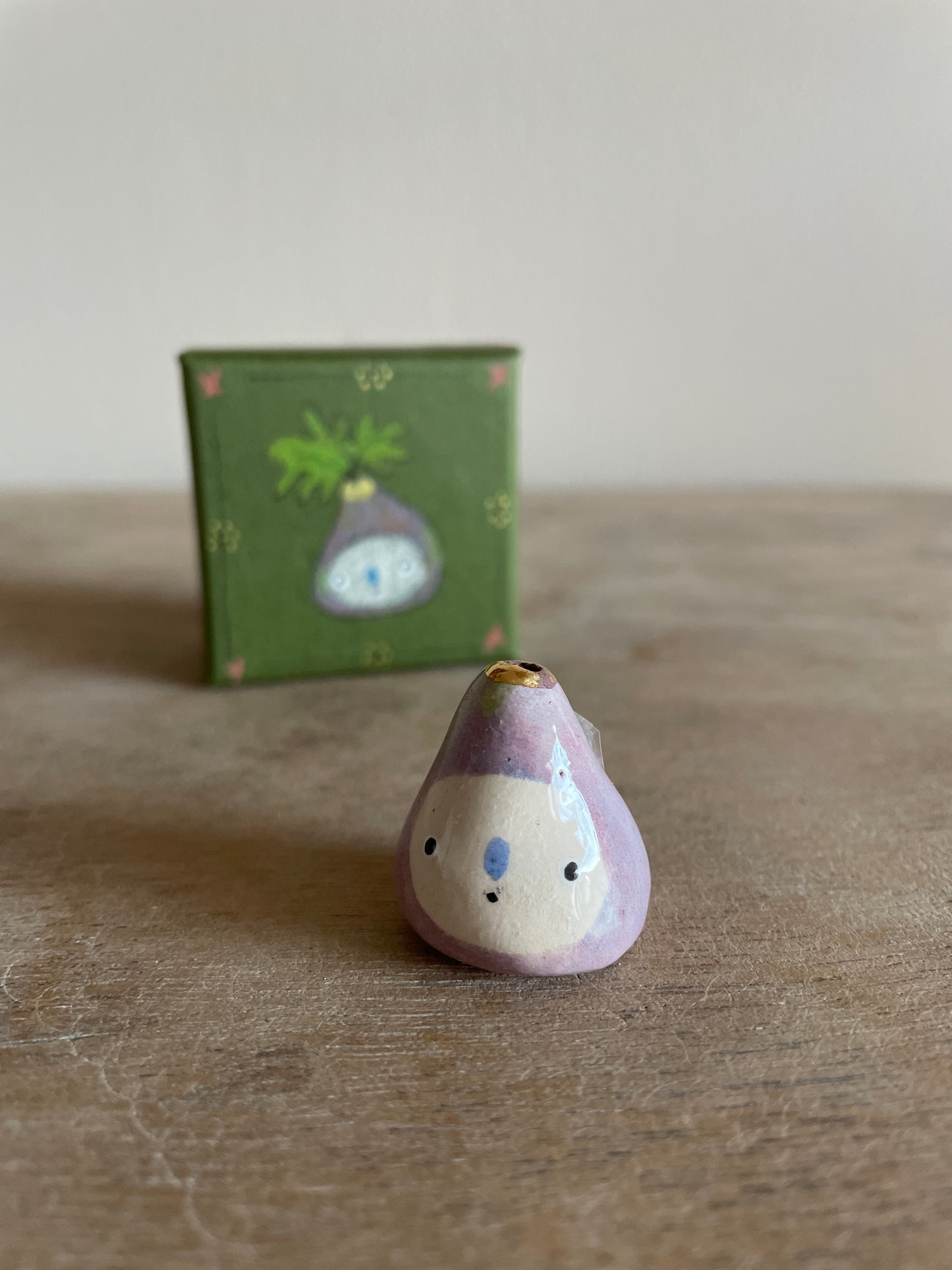 Mini figue faïence et or