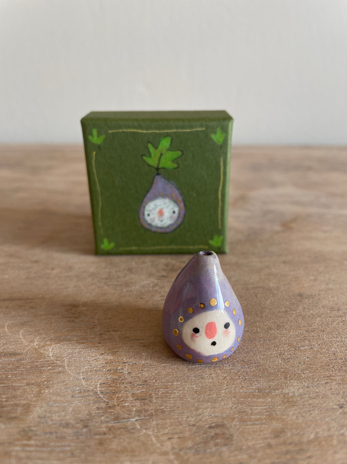 Mini figue faïence et or